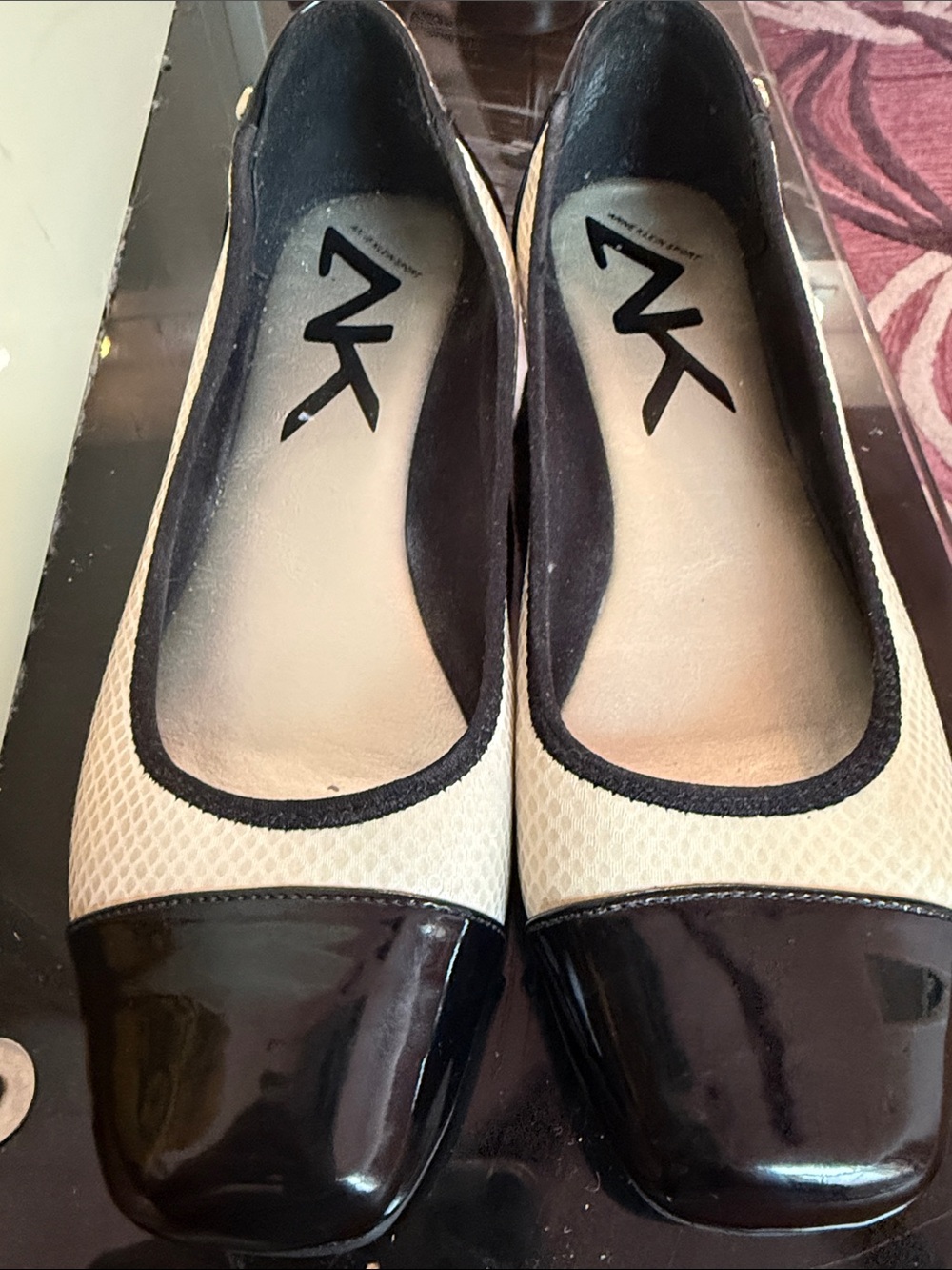 Anne Klein Black and Cream Two-Tone Cap-Toe Flats